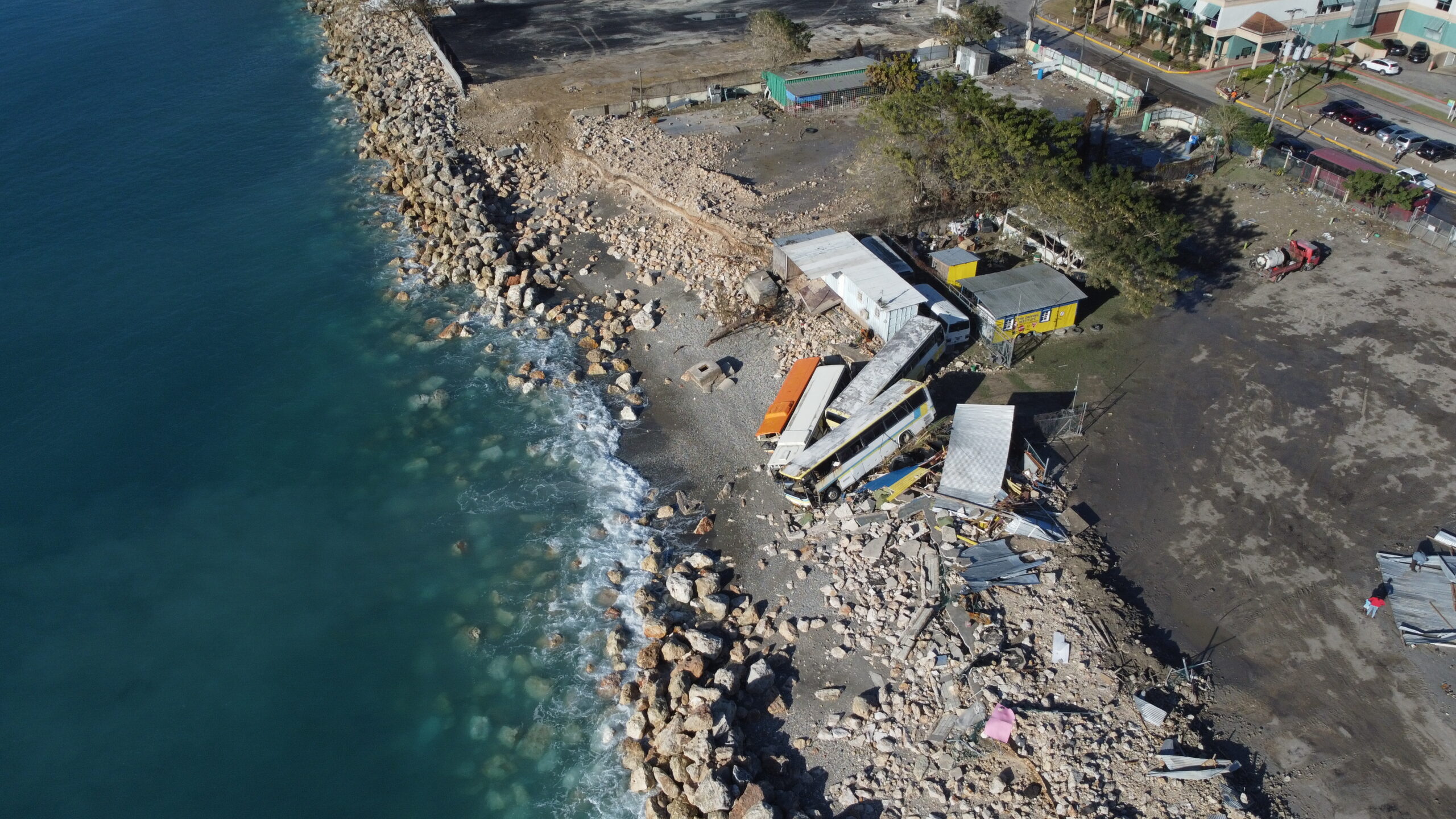 Waves from north swell destroy revetment Feb 2024